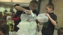 Go to Students, firefighters make milk jug castle