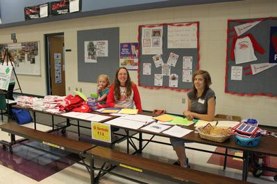 PTO members with a table set up at the St. Germain Elementary School open house