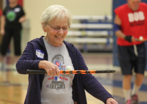 woman smiling and participating in senior olympics