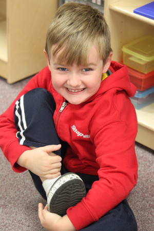 Montessori student smiling for picture